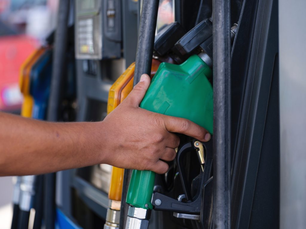 person filling up with fuel