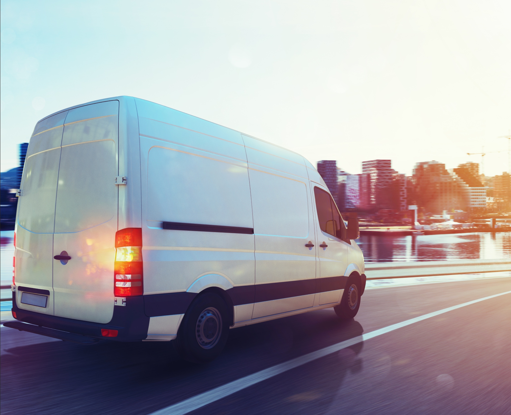 van driving on road