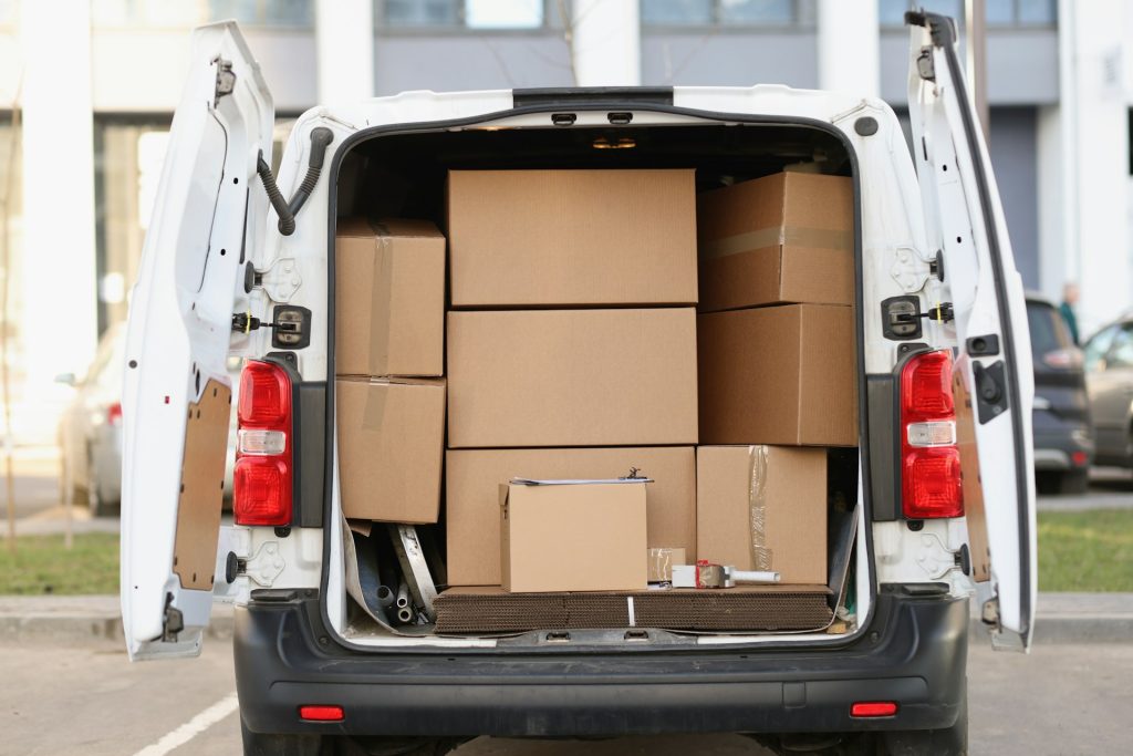 Back of van open with boxes in it